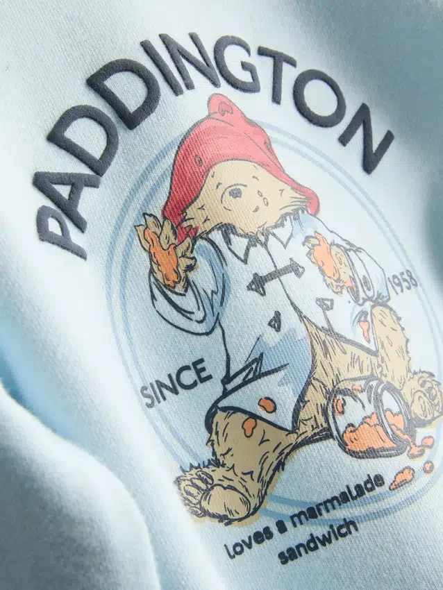 0–18 kk | Paddington-karhu-pitkähihainen vastasyntyneen body