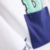 0–36 kk | Disneyn Donald Duck -paita ja Shortsit