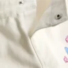 1,5–8 v. | Disneyn Stitch-kontrastikuvioiset denimshortsit