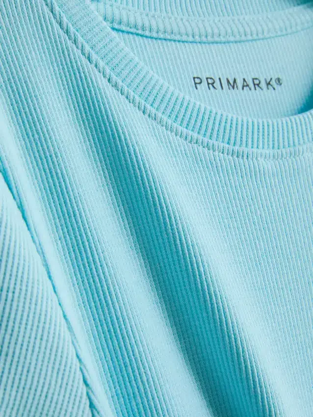 1,5–8 v. | ribbineuloksella reunustettu t-paita