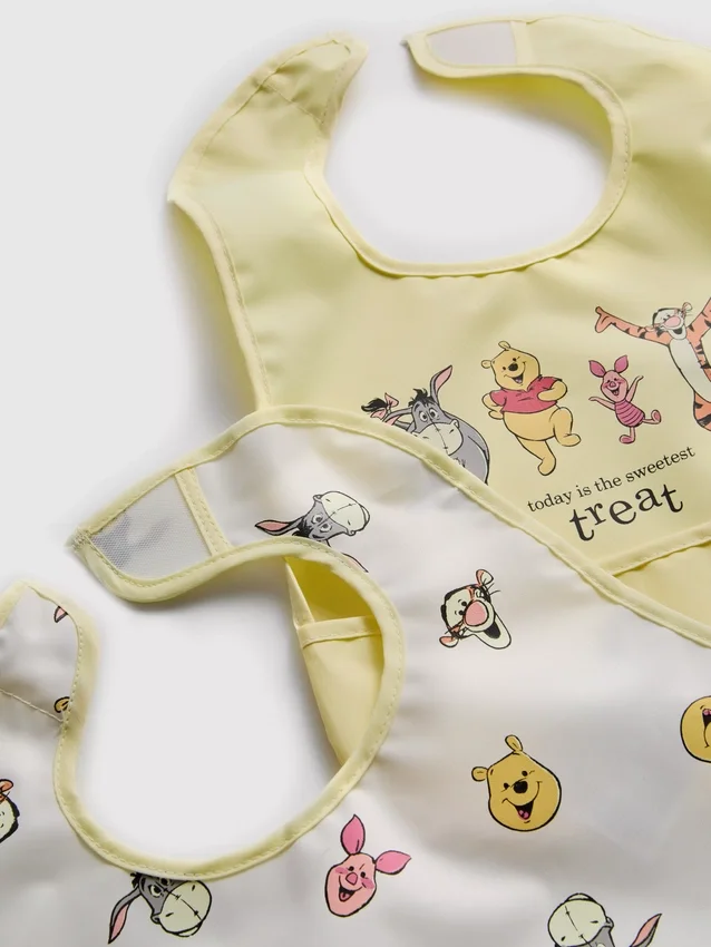 2 kpl:n pakkaus Disneyn Nalle Puh -kääreruokalappuja