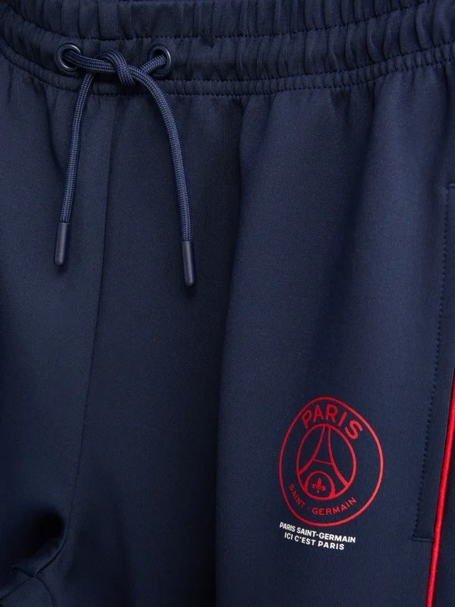 7–15 v. | Paris Saint-Germain F.C. -collegehousut, joissa on käänteiset lahkeensuut