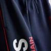 7–15 v. | Paris Saint-Germain F.C. -collegehousut, joissa on käänteiset lahkeensuut