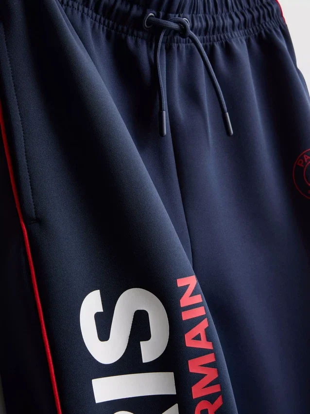 7–15 v. | Paris Saint-Germain F.C. -collegehousut, joissa on käänteiset lahkeensuut