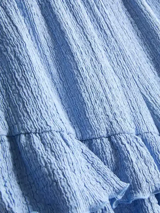 7–15 v. | ryppyiset kerrokselliset shortsit