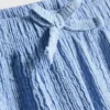7–15 v. | ryppyiset kerrokselliset shortsit