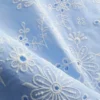 Broderie-koristeltu sivusidottava toppi