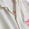Coca-Cola-lyhythihainen paita