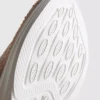 Diamanttiyksityiskohdilla varustetut slip-on-tennarit