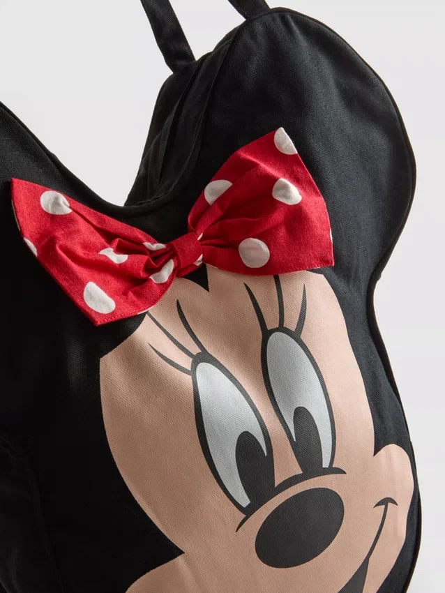 Disneyn Minnie Mouse -hahmolla koristeltu kangaskassi