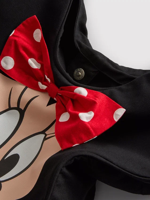 Disneyn Minnie Mouse -hahmolla koristeltu kangaskassi