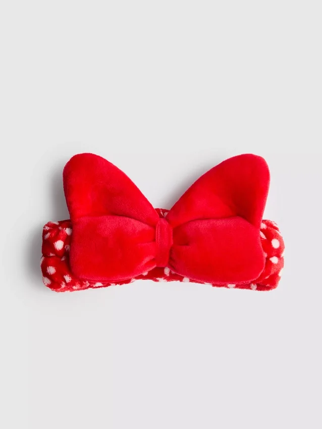 Disneyn Minnie Mouse -pehmopäähine, jossa on rusetti