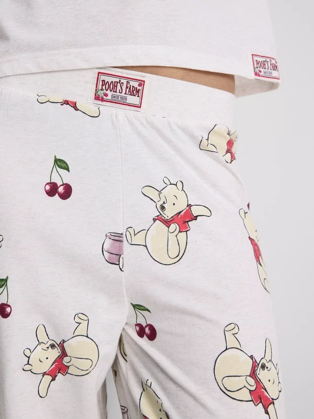 Disneyn Nalle Puh -kuvioiset pyjamahousut