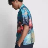 Flamingokuvioinen lyhythihainen kauluspaiti