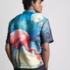Flamingokuvioinen lyhythihainen kauluspaiti