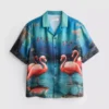 Flamingokuvioinen lyhythihainen kauluspaiti