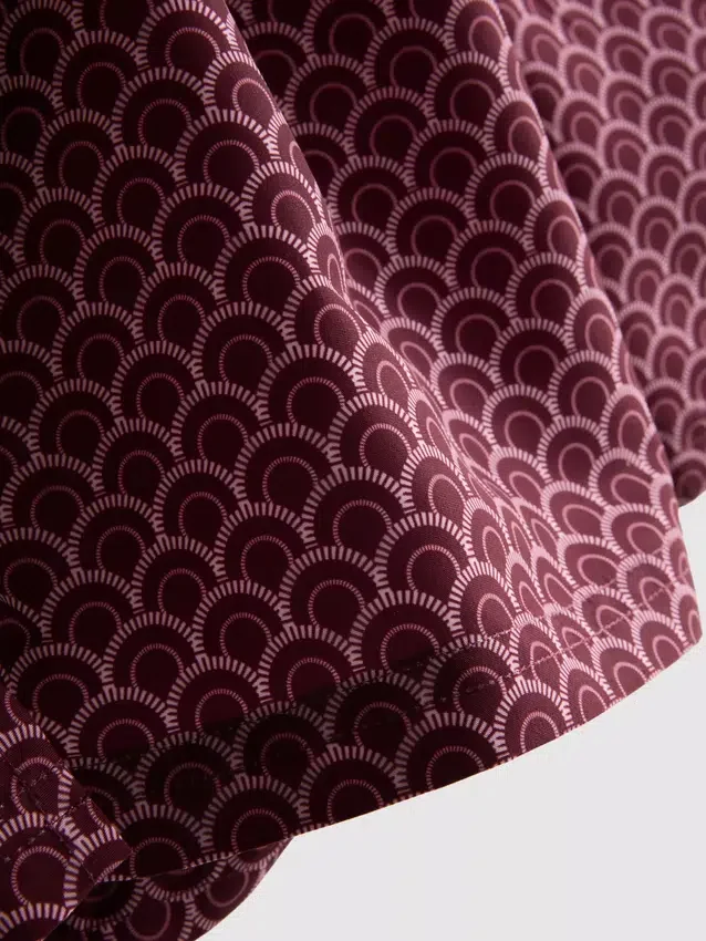 Geometriset uimahousut, joissa on kiristysnauha