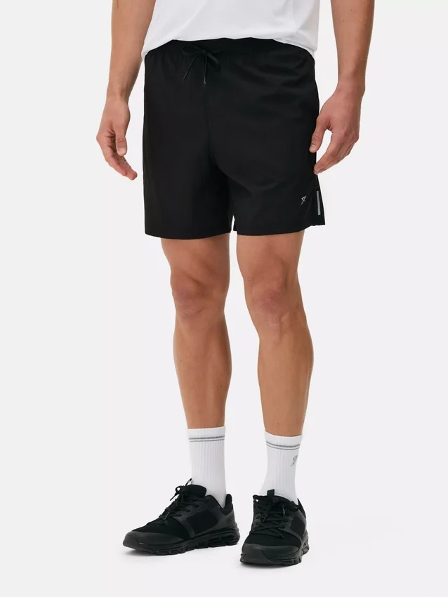 Juoksushortsit kiristysnauhalla