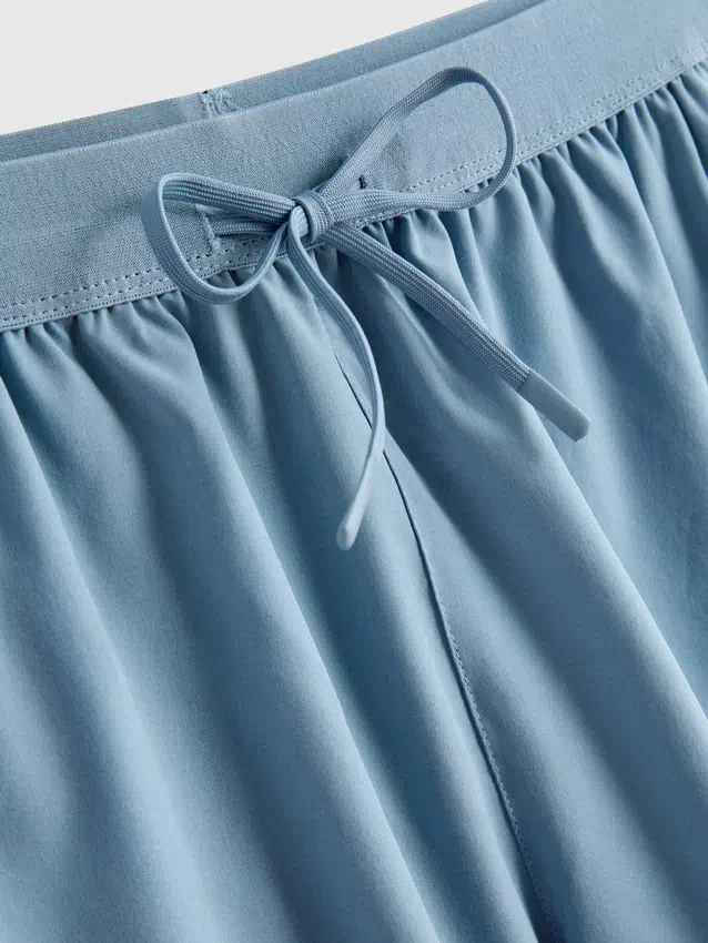 Juoksushortsit kiristysnauhalla