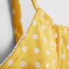 Kaarituellinen, sydänkaula-aukkoinen, pilkullinen bikiniliivi