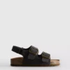 Kaksinkertaisella soljella varustetut slingback-sandaalit