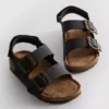 Kaksinkertaisella soljella varustetut slingback-sandaalit