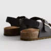 Kaksinkertaisella soljella varustetut slingback-sandaalit