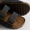 Kaksinkertaisella soljella varustetut slingback-sandaalit