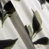 Kasvikuviollinen lyhythihainen napituskauluspaiti