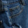 Keskikorkeat, ylös käännettävät denimshortsit