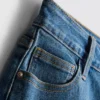 Keskikorkeat, ylös käännettävät denimshortsit