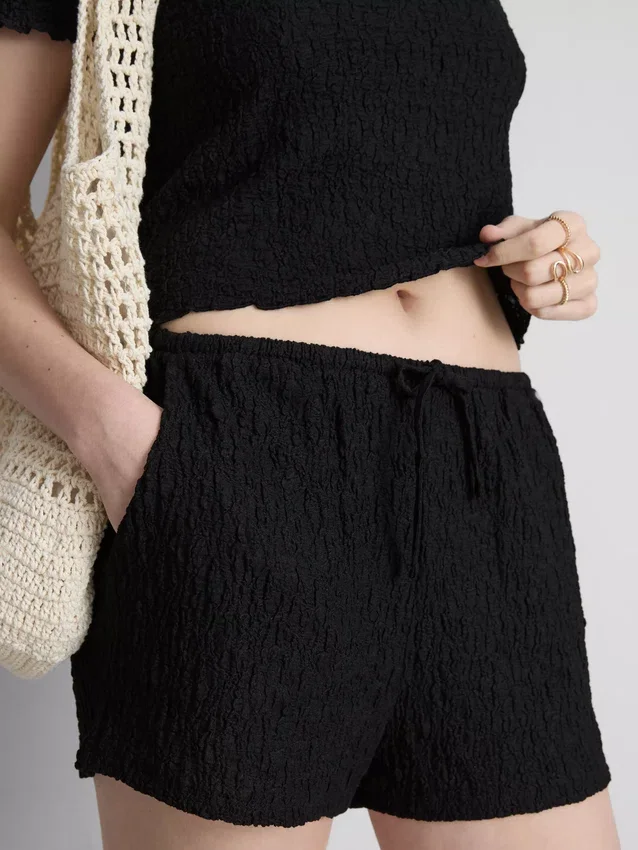 Kiristysnauhalliset ryppyiset shortsit
