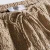 Kiristysnauhalliset ryppyiset shortsit