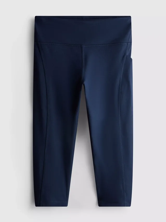 Korkeavyötäröiset, sileät ja tukevat capri-leggingsit