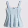 Kreppinen peplum-toppi, jossa on sydämenmuotoinen pääntie