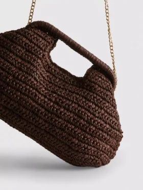 Kudottu clutch-laukku