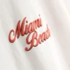 Miami Beach -kuvioinen t-paita