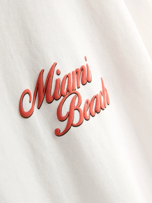 Miami Beach -kuvioinen t-paita
