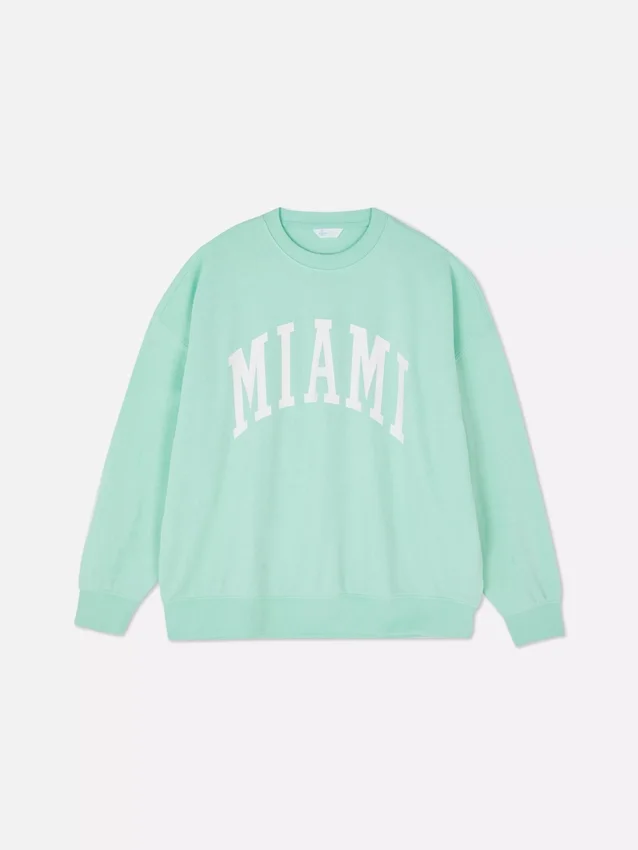 Miami-kirjaimin koristeltu oversized-huppari