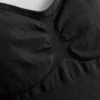 Muotoilevat alusvaatteet string-bodysuitina