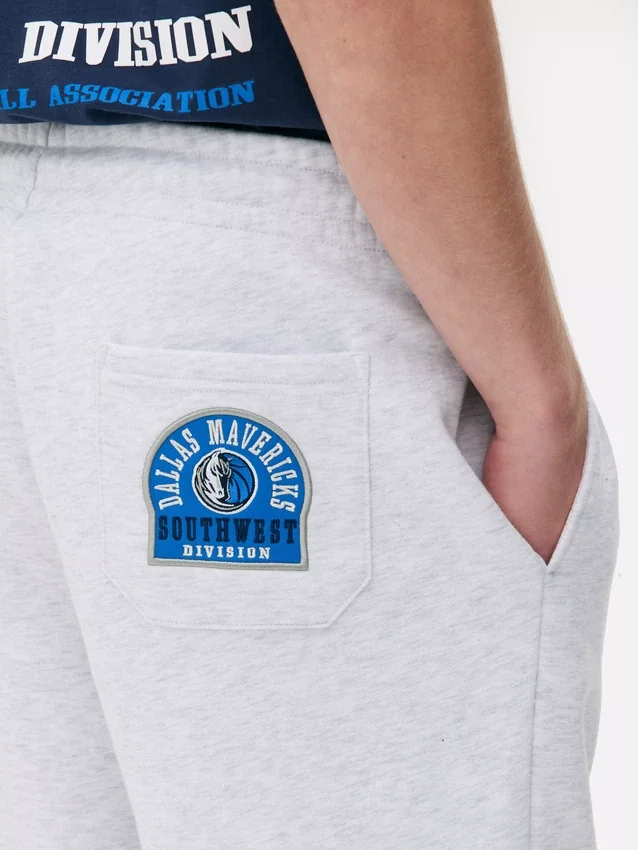 NBA Dallas Mavericks -vetoketjulliset verryttelyhousut