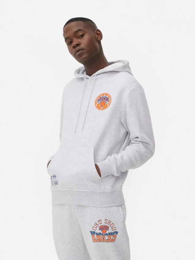 NBA New York Knicks -huppari, jossa kiristysnauha