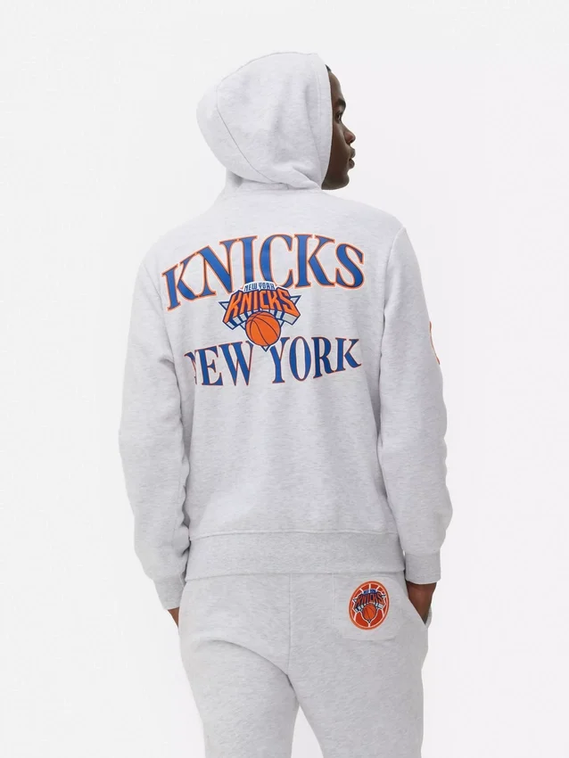 NBA New York Knicks -huppari, jossa kiristysnauha
