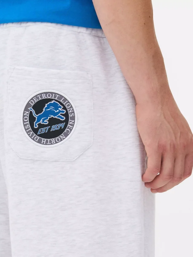 NFL Detroit Lions -collegehousut, joissa on kiristysnauha
