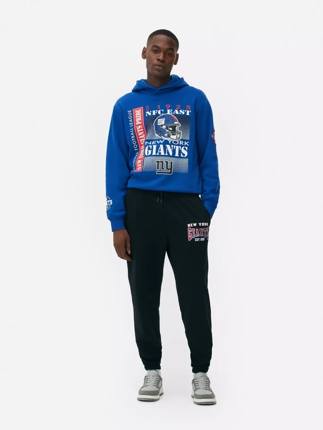 NFL New York Giants -collegehousut, joissa on käänteiset lahkeensuut