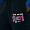 NFL New York Giants -collegehousut, joissa on käänteiset lahkeensuut