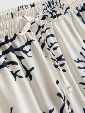 Painetut korallinväriset pyjamat-shortsit