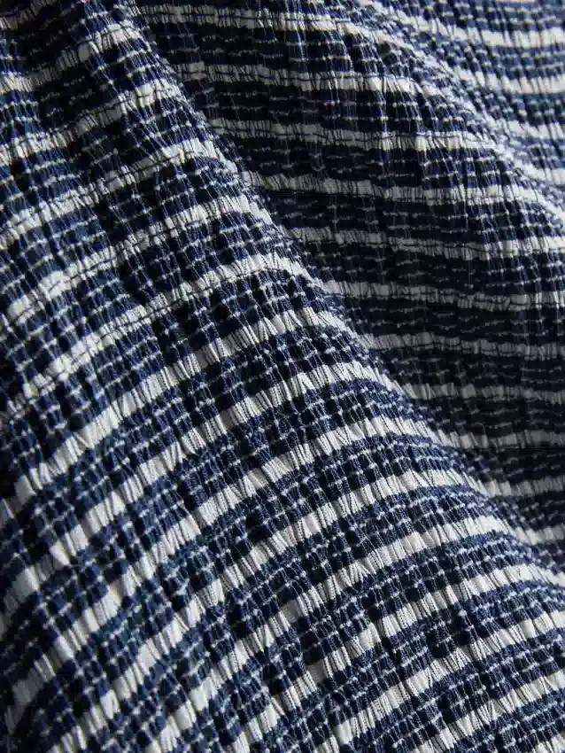 Paula Echevarría -gingham-ruusukoristeinen bandeau-toppi