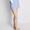 Puuvilladenimiset jogger-shortsit