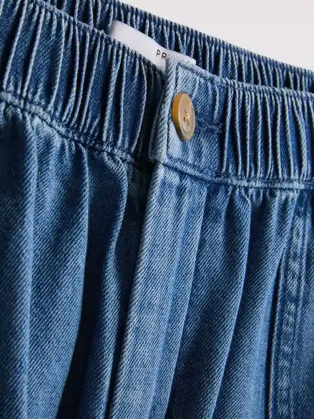 Puuvilladenimiset työshortsit